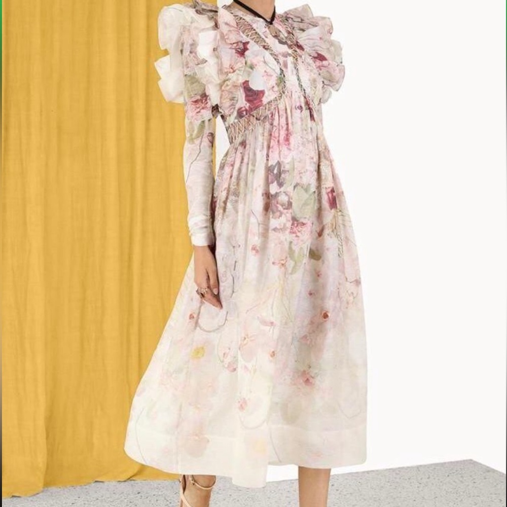 ZIMMERMANN
Ruffled floral-print linen and silk-blend midi dress.